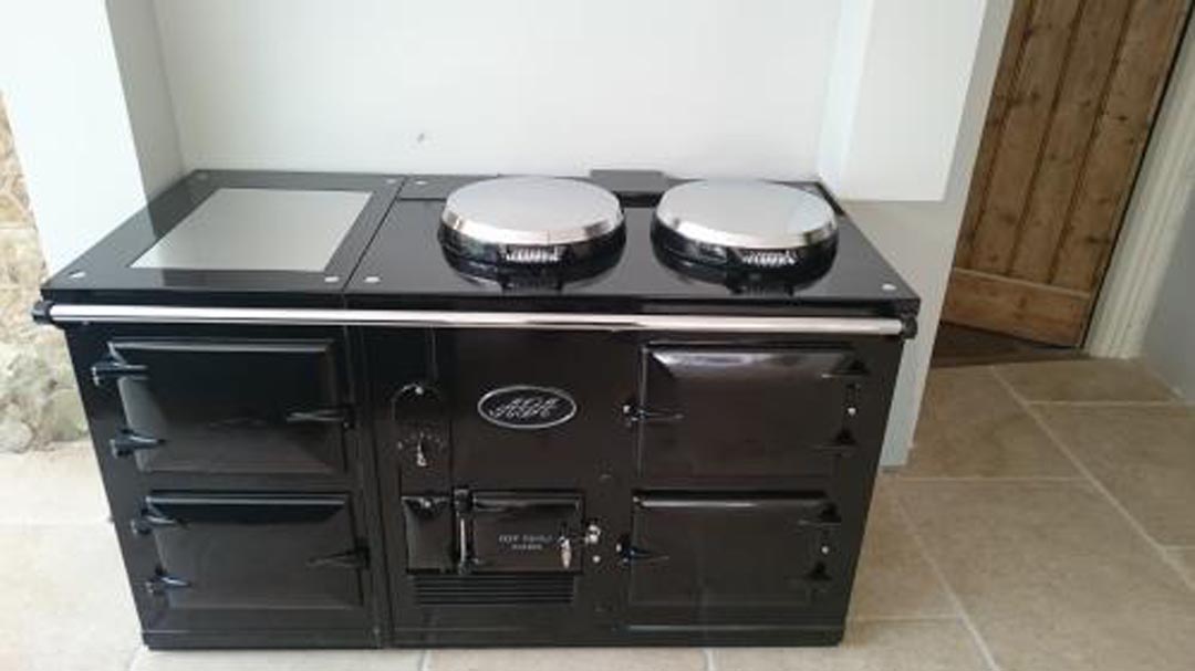 4 Oven Aga Standard fully reconditioned Re-Enamelled in Black.
Converted to Electric.
Installed in Haslemere